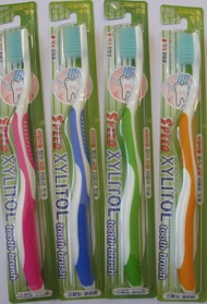 Toothbrush with xylitol